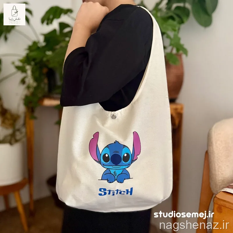 تت بگ کفی دار مدل گرد طرح استیج stitch دارای جیب، کفی و دکمه فلزی